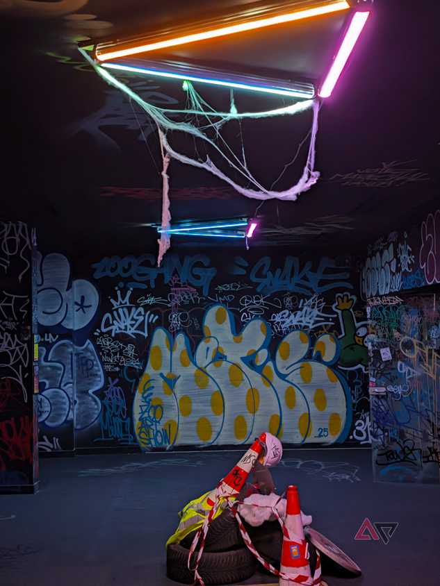 Google Pixel 11 Pro XL camera sample of some graffiti and neon with Camera Look Original