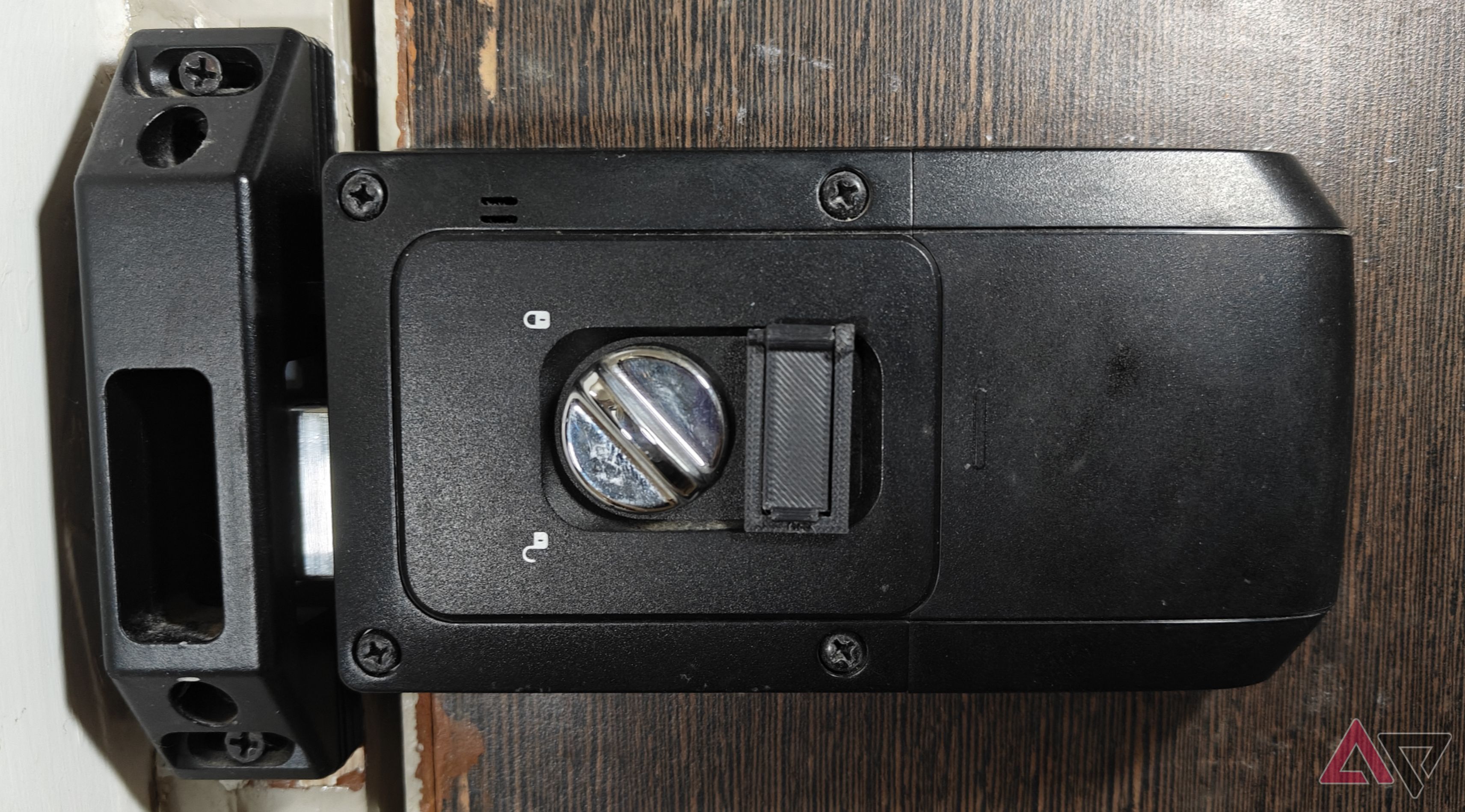 Photo showing the 3D-printed door lock cover
