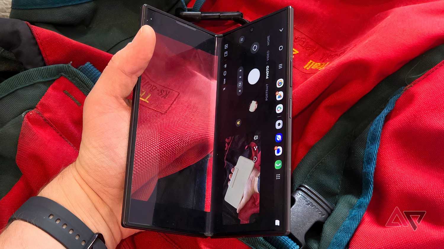 The Samsung Galaxy Z Fold 8 Ultra in Flex Mode, showing the camera viewfinder.
