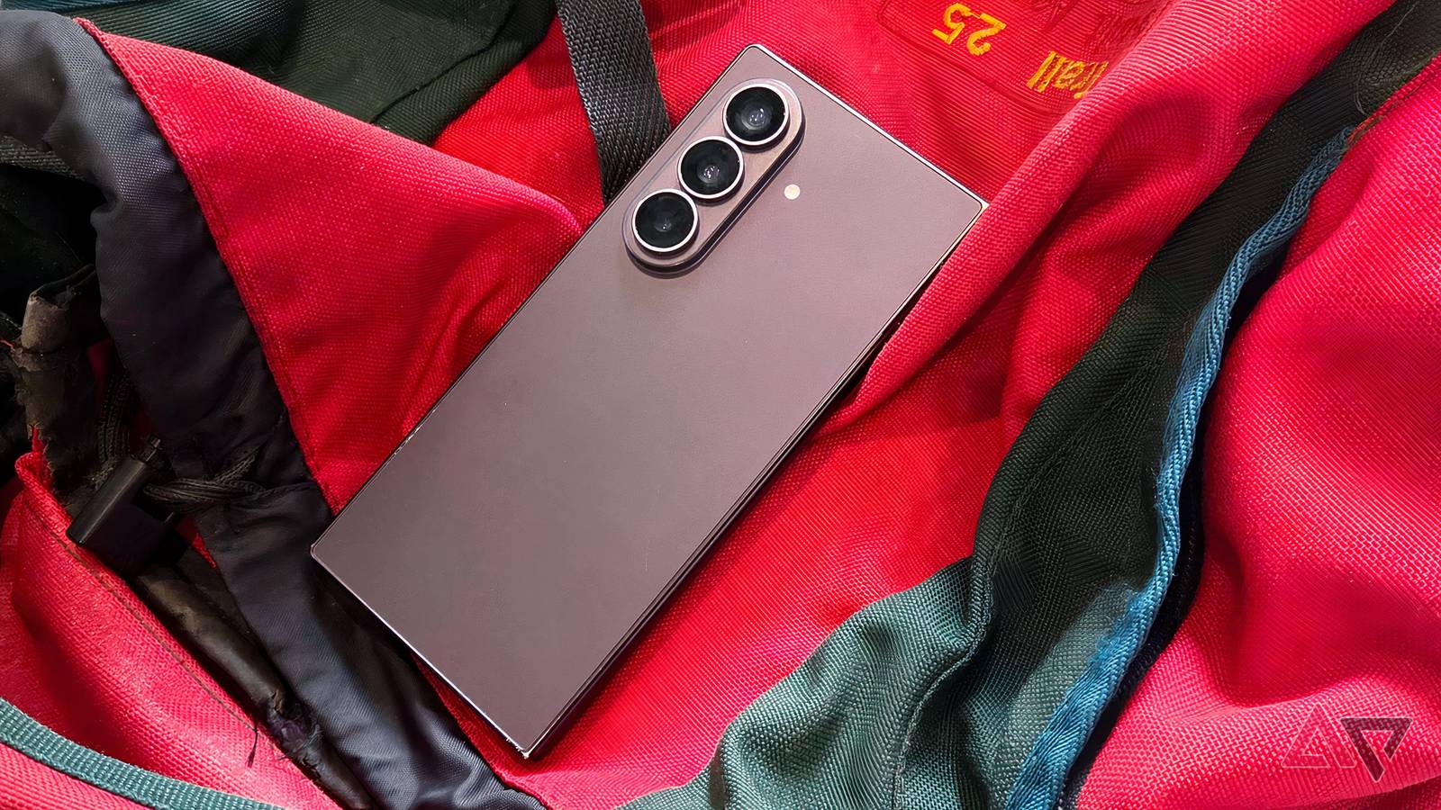 The Samsung Galaxy Z Fold 8 Ultra on a red rucksack.