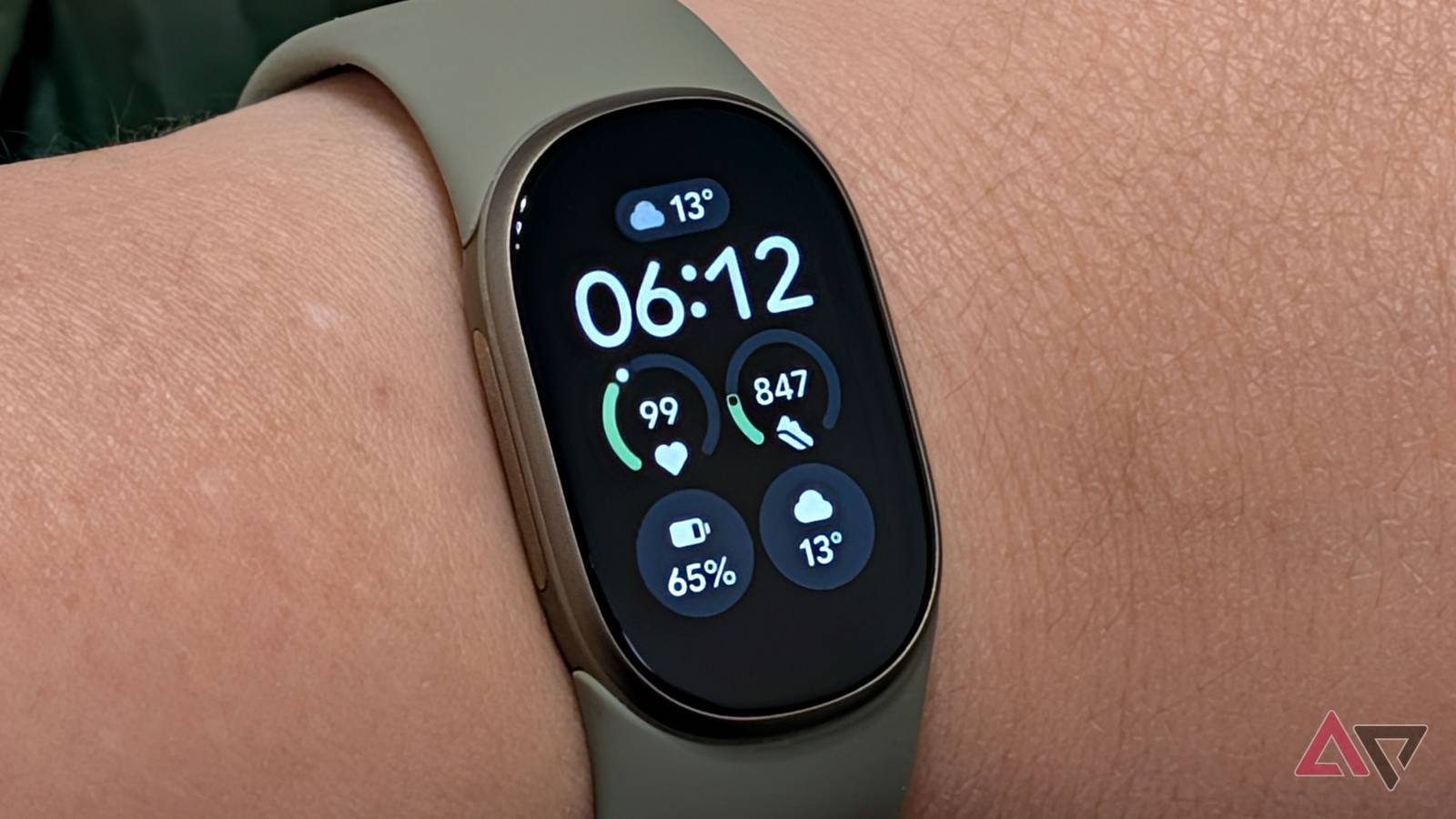 Google Fitbit Edge on a wrist with the Modular watch face