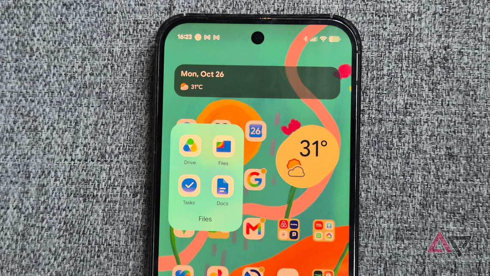 Google Pixel 9 Pro XL with Google Workspace apps, including Drive Files Task and Docs in an app folder.