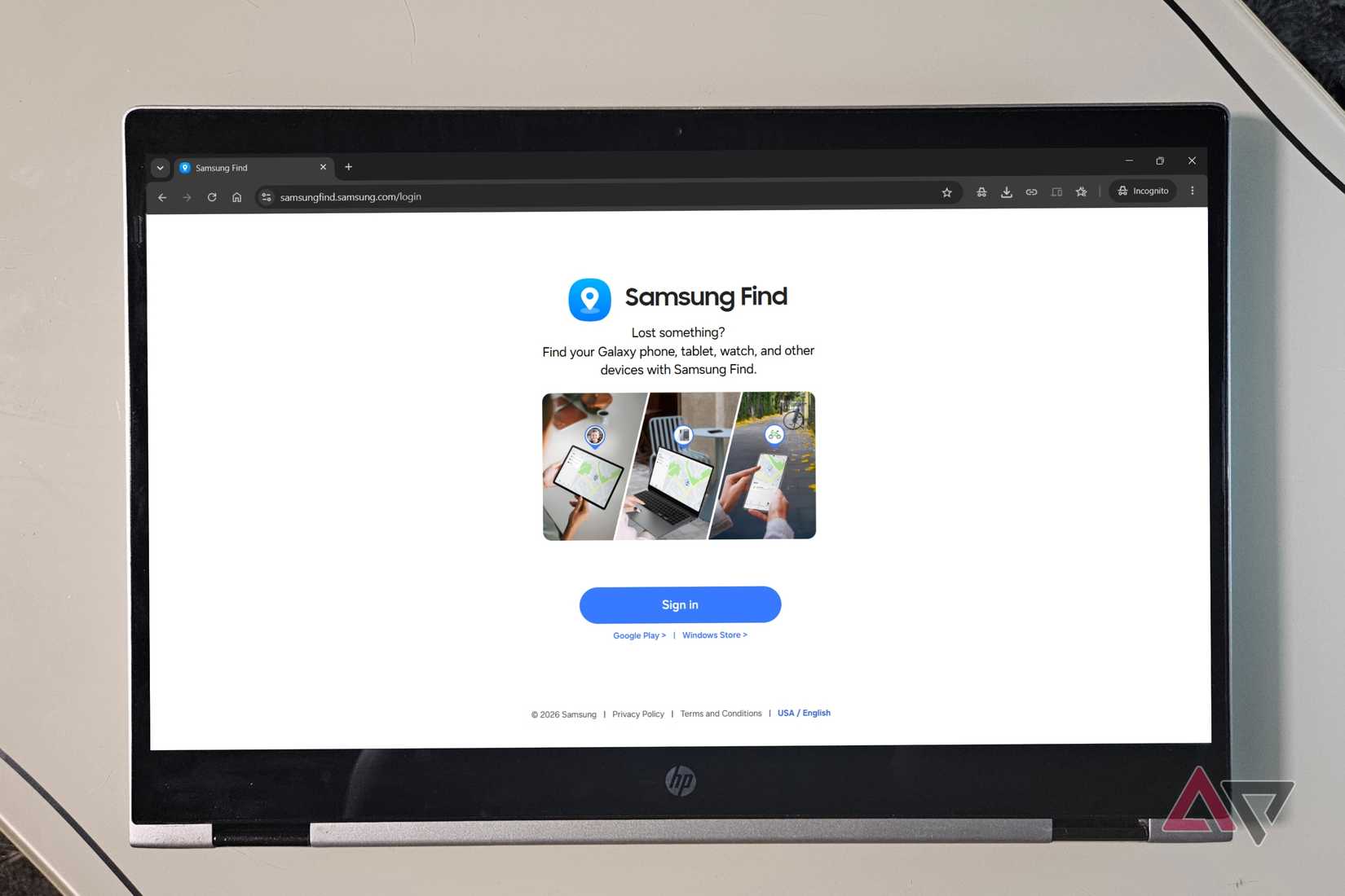 HP laptop on a desk with the Samsung Find login page opened on screen