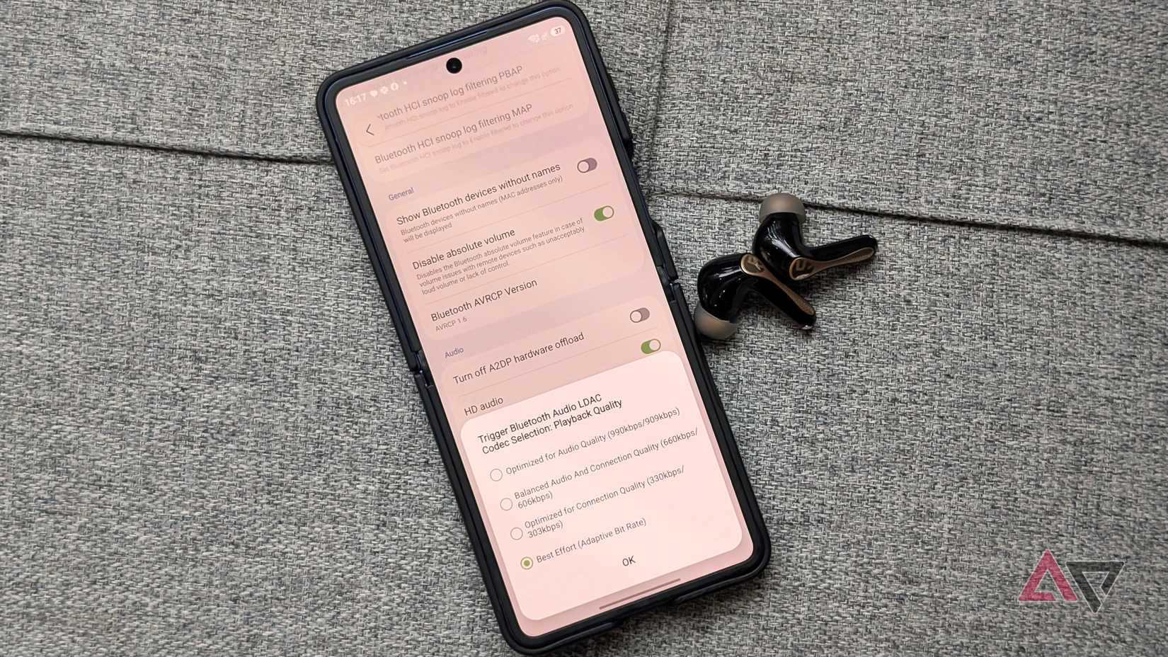 Samsung Galaxy Z Flip 7 foldable smartphone and Soundpeats Air5 Pro+ wireless earbuds
