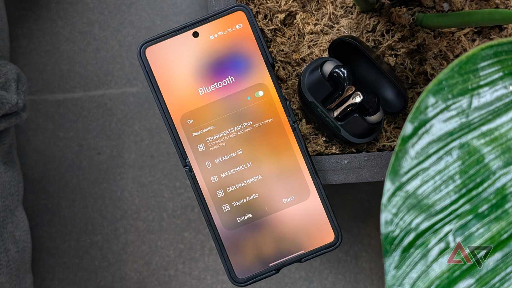 Samsung Galaxy Z Flip 7 foldable smartphone and Soundpeats Air5 Pro+ wireless earbuds