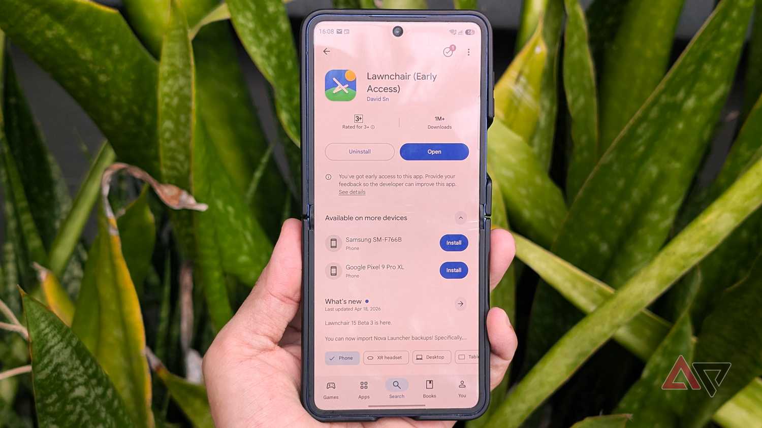 Samsung-Galaxy-Z-Flip-foldable-phone-on-a-hand-with-Lawnchair-app-launcher-on-google-play-store