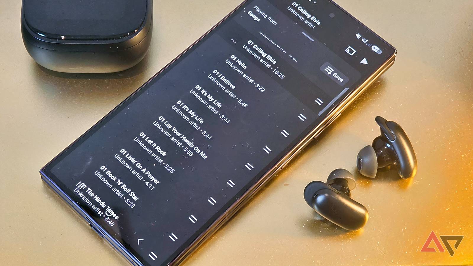 A Samsung Galaxy Z Fold 8 Ultra showing a list of songs on YouTube Music.