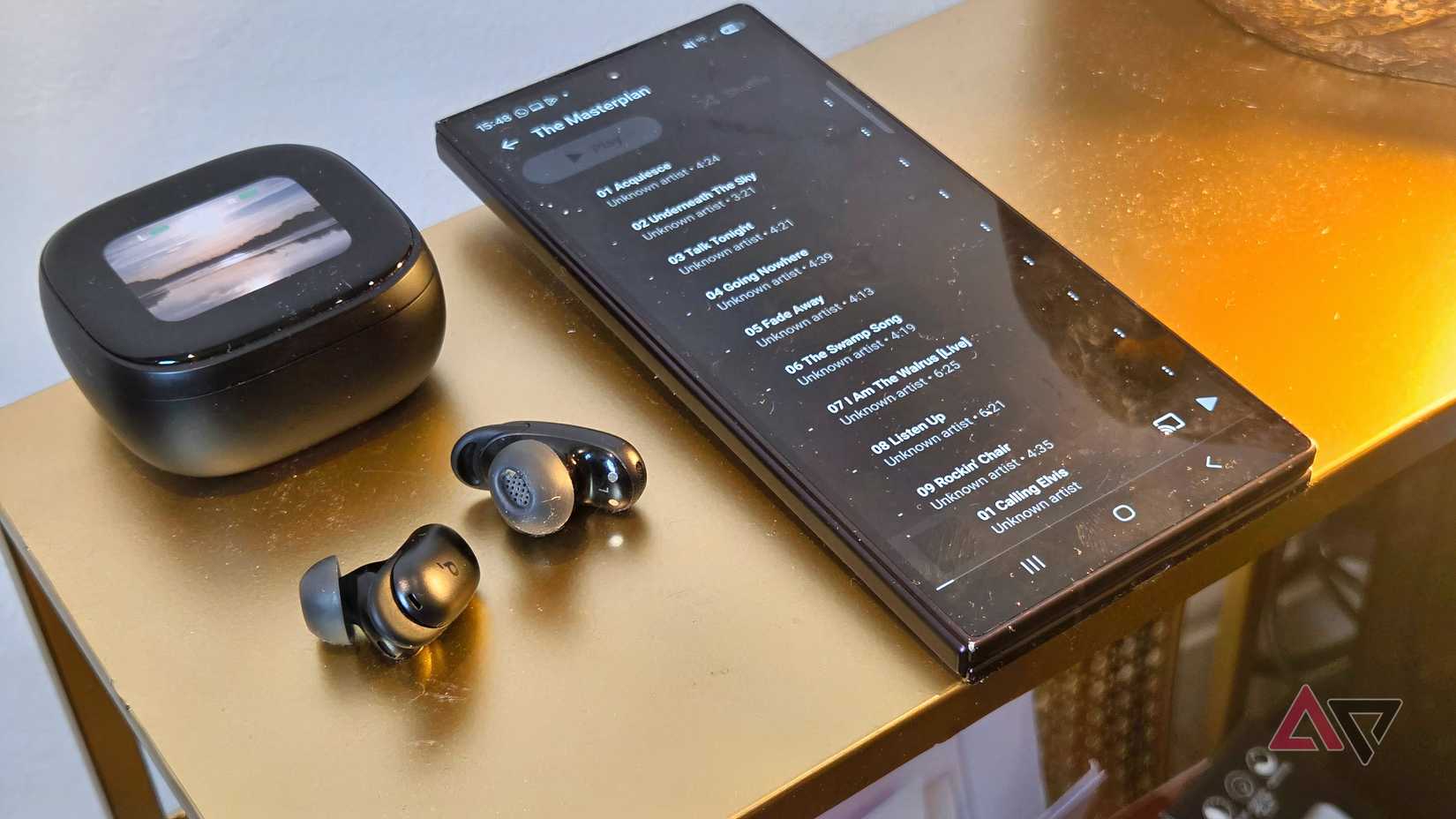 A Samsung Galaxy Z Fold 8 Ultra showing a list of songs on YouTube Music.
