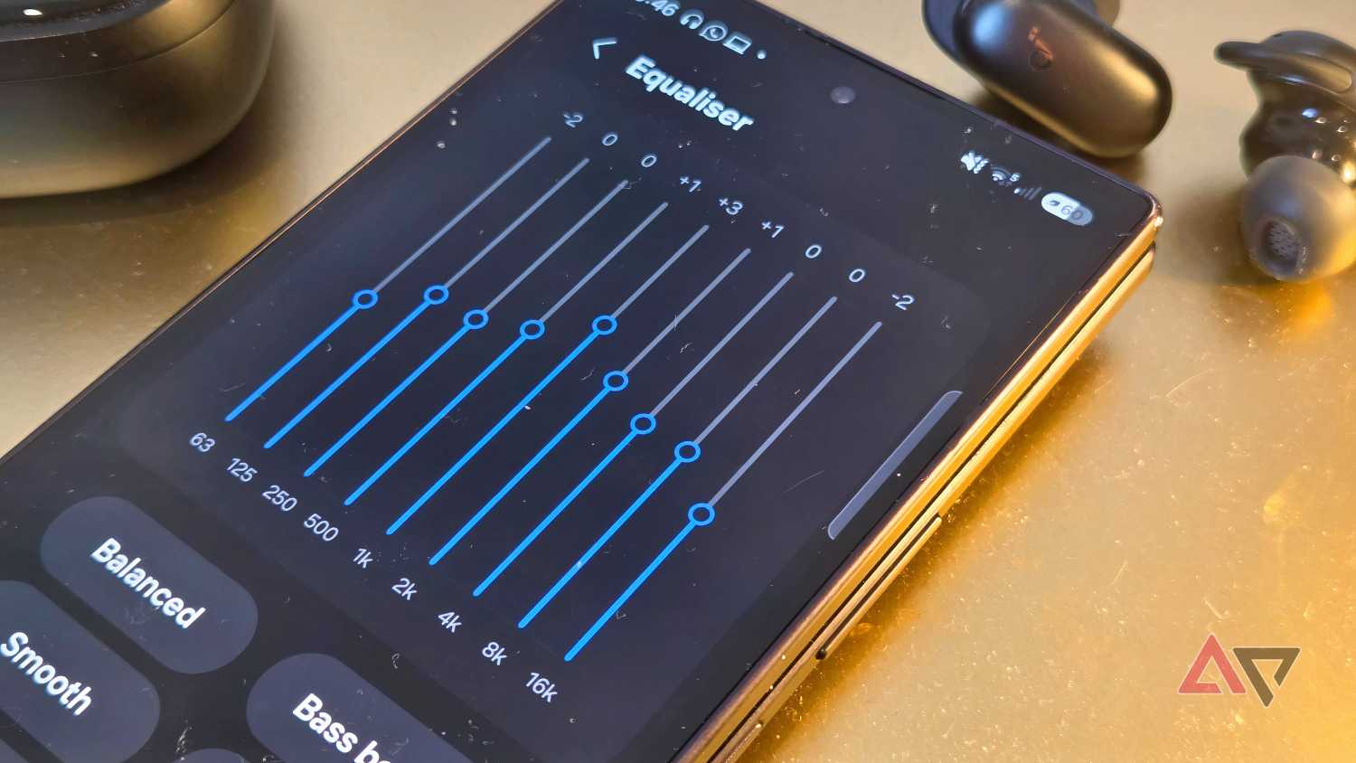 A Samsung Galaxy Z Fold 8 Ultra showing a custom EQ on YouTube Music.